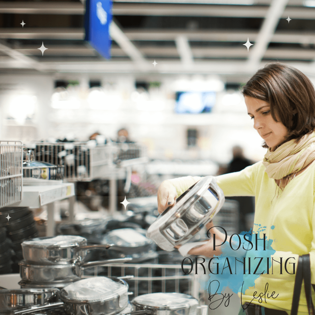 A woman carefully inspects the quality of the kitchenware before buying it.